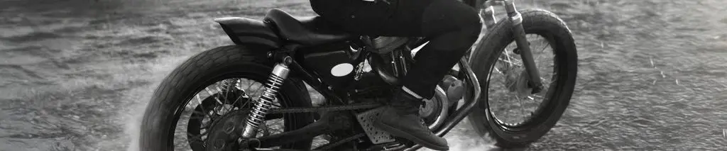 Image of someone riding a motorcycle.