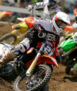 A person riding a dirt bike in a race