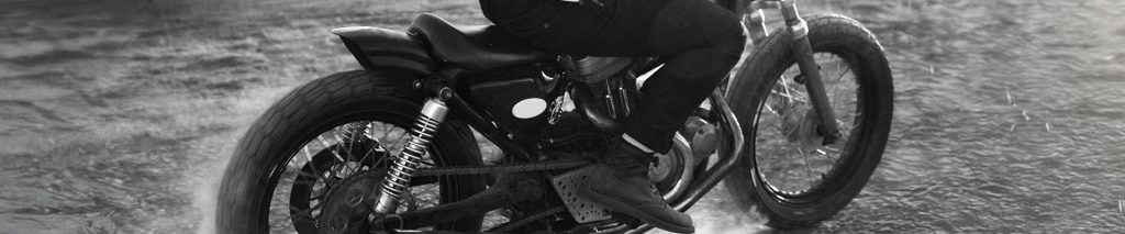 Image of someone riding a motorcycle.