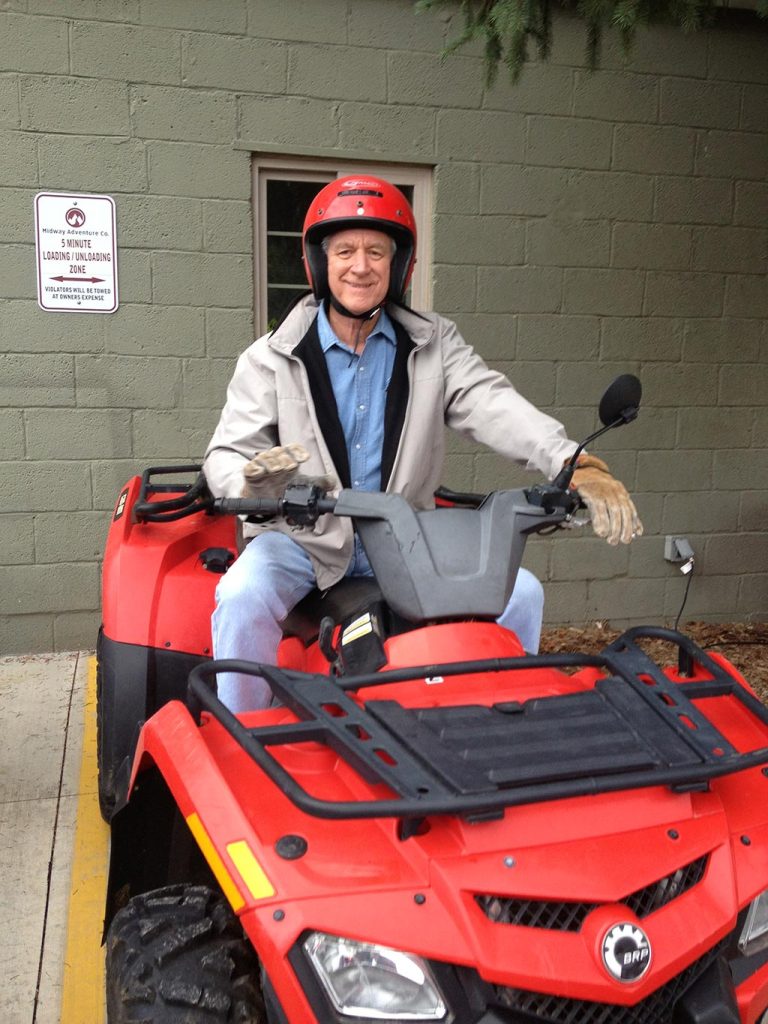 Image of Hal Ethington on a red BRP ATV.