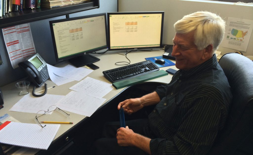 Hal Ethington working at a computer.