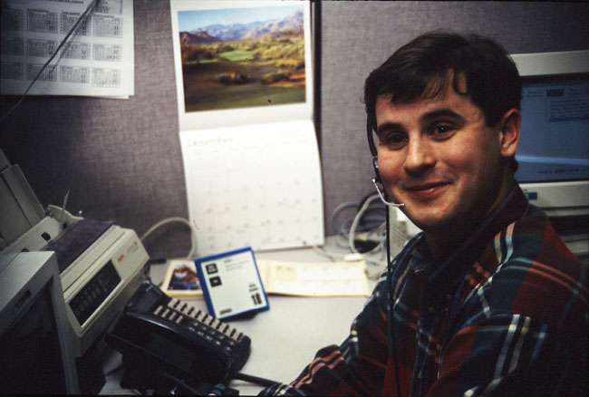 John McFarland working in a office with 1990's technology.