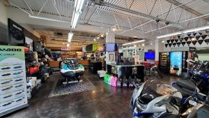 Image of a store floor with motorsports vehicles.